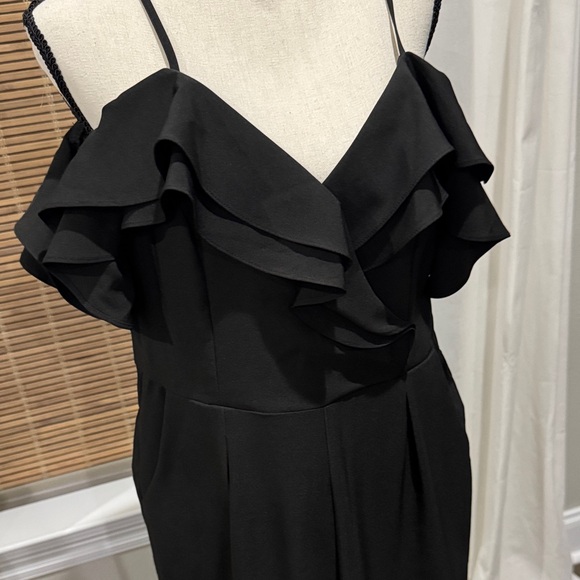 Chic Black Ruffled Jumpsuit - Picture 2 of 3